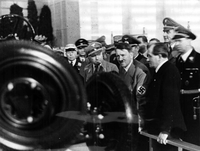 Adolf Hitler with Ferdinand Porsche and Robert Ley at the Volkswagen booth of the International Motor Show in Berlin 